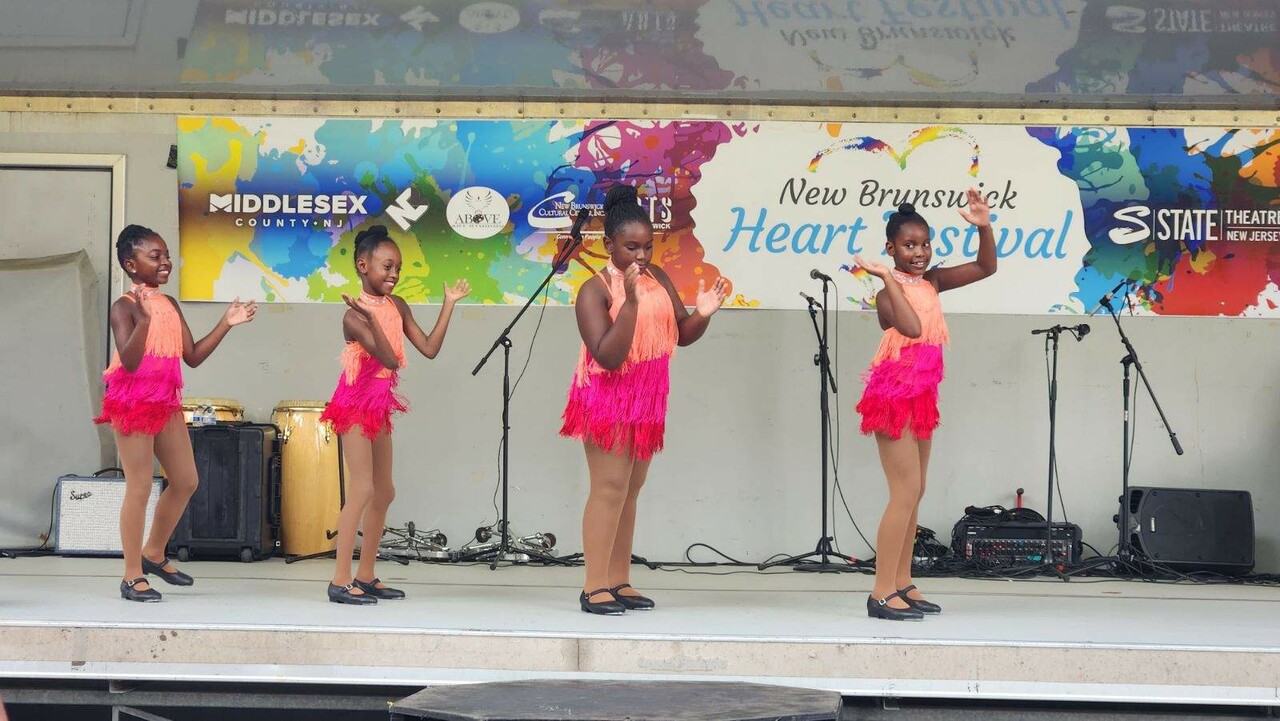 Children dancing on a stage for the Heart Festival